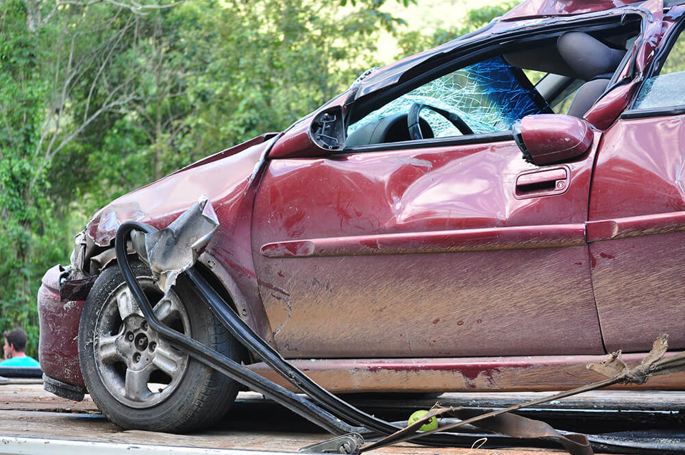 smashed red car