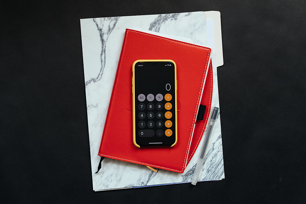 Calculator on red notebook